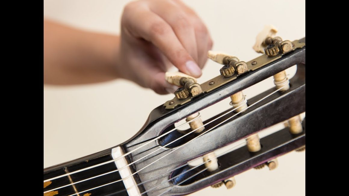 How to Tune an Acoustic Guitar: A Beginner's Guide